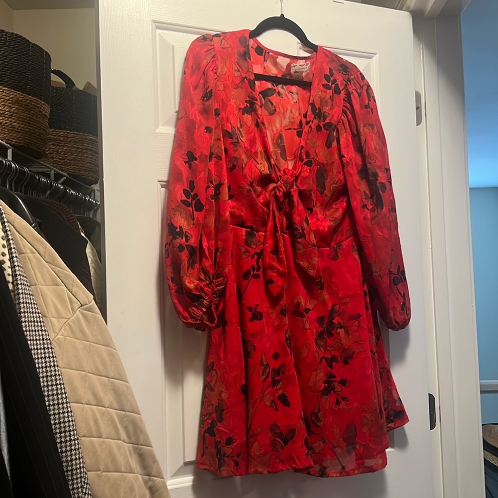 Red dress with a tire across the chest